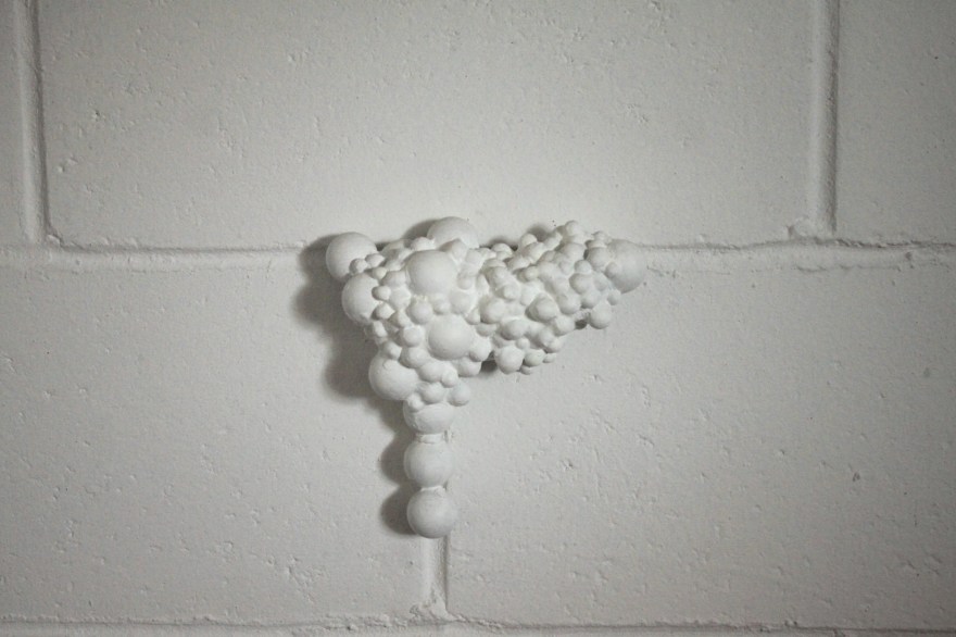 Blooming through the wall